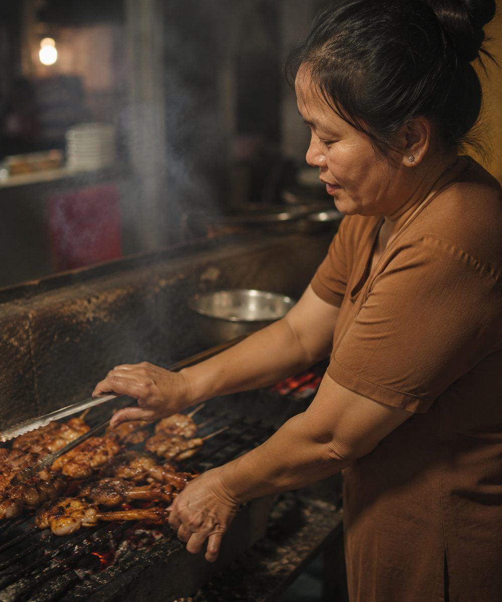 Lan cooking at the char-grill
